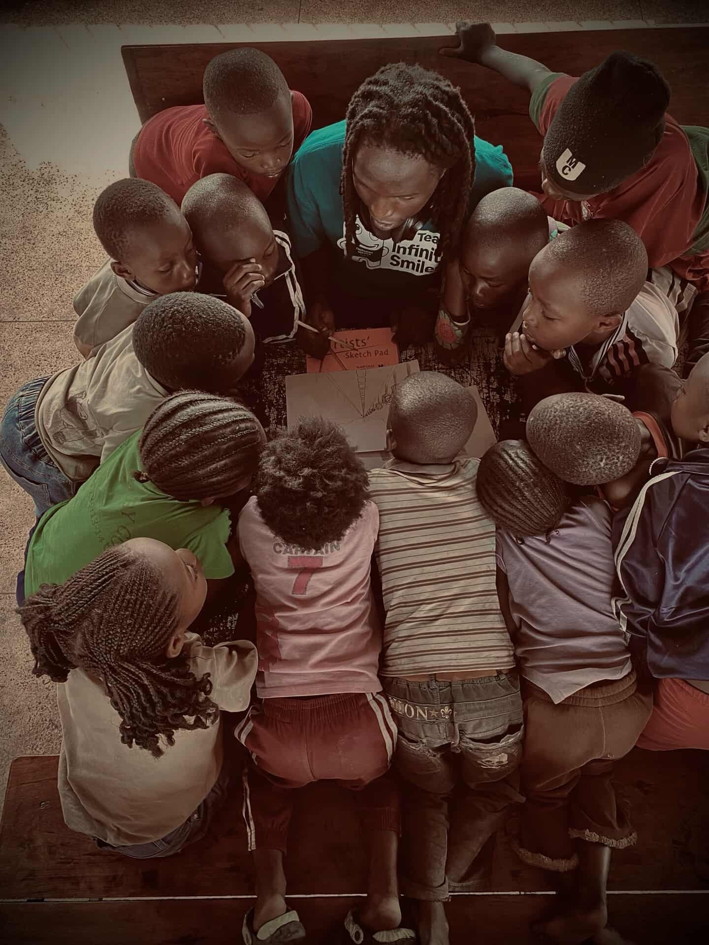 Children participating in an Ndambuki Art Lab art class